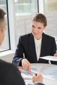 Businesswoman discussing marketing data